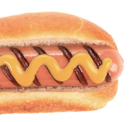 Close up of hotdog with mustard.
