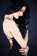 portrait of elegant beautiful woman in black dress