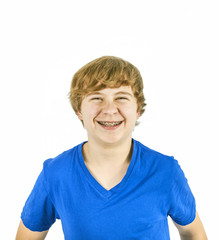 handsome teenage boy with blue shirt
