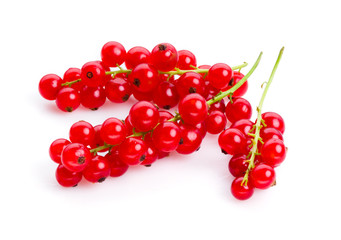 Red currant. Berries on stem isolated on white