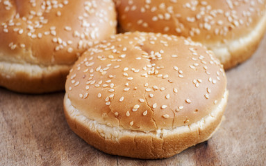 baked bread on wooden background