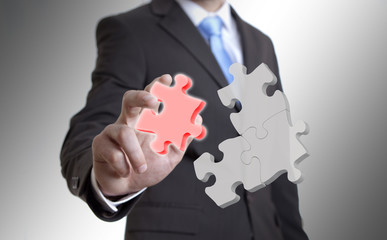 Businessman solution puzzle concept