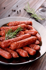 Smoked sausages on a plate