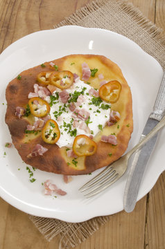 hungarian langos with bacon and cream
