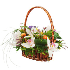 Fototapeta na wymiar Bouquet from orchids in in wicker basket isolated on white backg