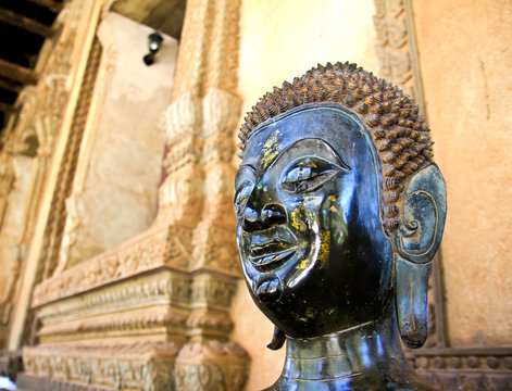 Bronze Buddha statue at the Haw Phra Kaew, Vientiane, Laos.