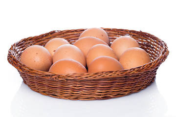 Brown eggs in basket