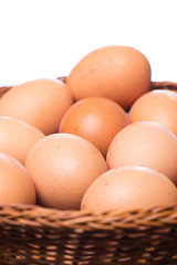 Brown eggs in basket