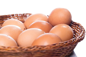 Brown eggs in basket