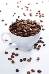 Coffee beans and cup
