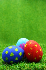 Easter eggs on grass background