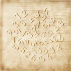 Number scattered on wooden table