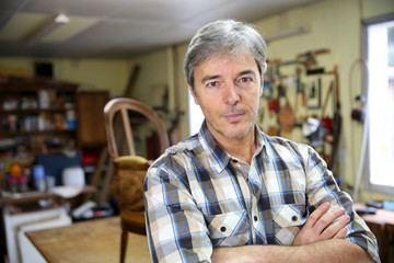 Fototapeta premium Portrait of craftsman in workshop