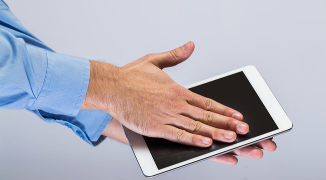White tablet pc in hands