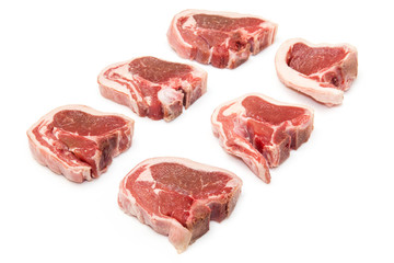 lamb chops isolated on a white studio background.
