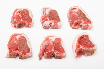 lamb chops isolated on a white studio background.