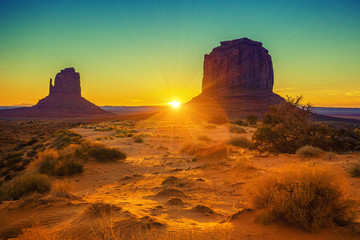 Sunset at the sisters in Monument Valley