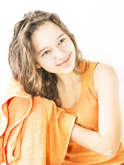 girl after shower wipes hair towel