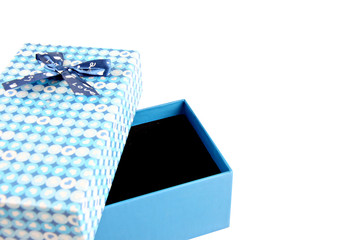 Blue gift box with a lid isolated.