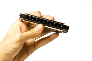 holding harmonica