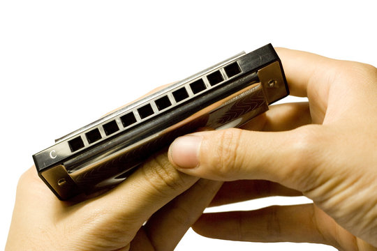 holding harmonica