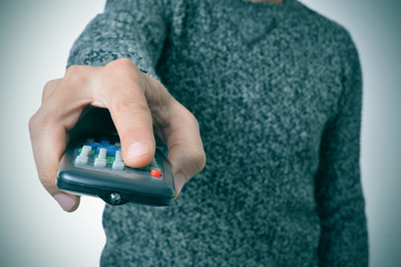 man using a remote control