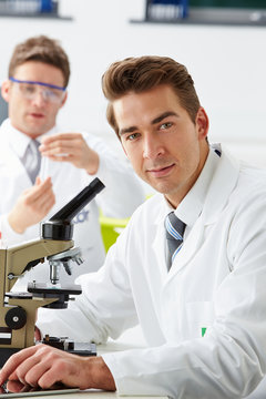 Technicians Carrying Out Research In Laboratory