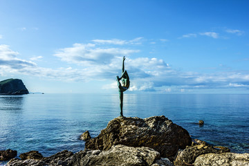Sunrise seascape, old town Budva, Montenegro - ballerina statue