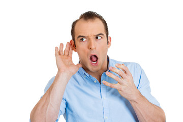 Shocked nosy man listening in to someones conversation