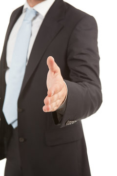 Detail of a business man with an open hand ready to seal a deal