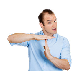 Serious business man, referee giving time-out