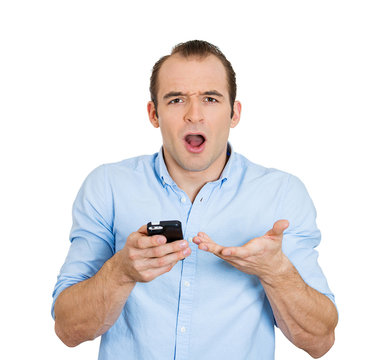 Upset, surprised man with mobile phone watching game