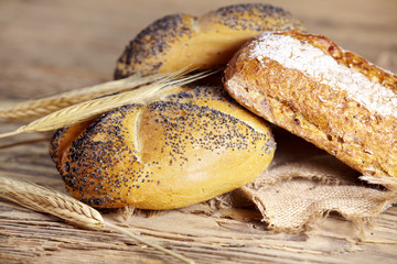 bread and wheat on the wooden