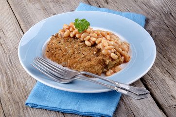 cod fillet in bread crumbs with baked beans