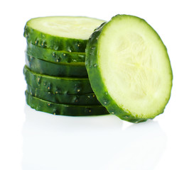 Sliced fresh cucumber, isolated on white