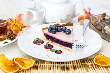 piece of blueberry pie on a table in a restaurant