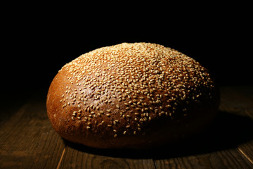 Loaf of bread on dark background