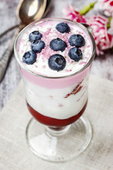 Yogurt dessert with summer fruits: strawberries, raspberries