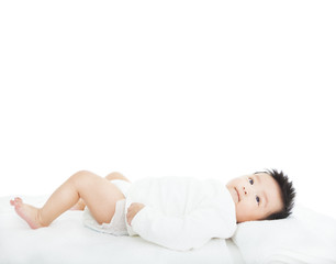 Obraz premium cute newborn infant baby lying down on towel