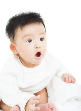 cute baby making a funny surprised face