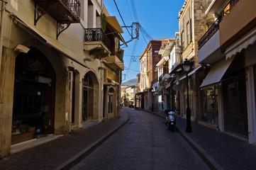 Fototapeta na wymiar Street with shops at the old part of the city Rethymno, Crete