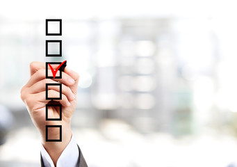 Hand choosing one of the options 