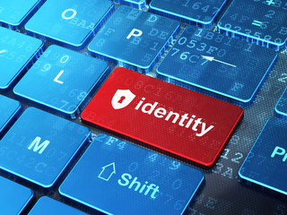 Security concept: Shield With Keyhole and Identity on computer