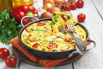 Papier Peint photo Oeufs sur le plat Omelet with vegetables and cheese. Frittata