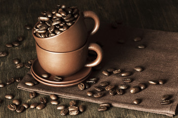 Coffee beans in cup