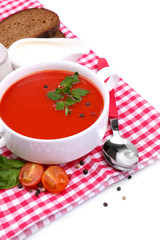 Tasty tomato soup and vegetables, isolated on white