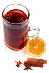 Mulled wine with lemon and spices isolated on white