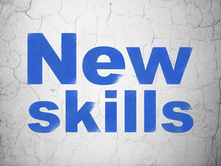 Obraz premium Education concept: New Skills on wall background