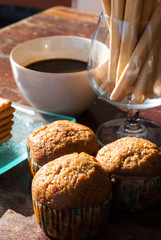 Breadsticks ,Banana cake and Biscuits with black coffee in the m