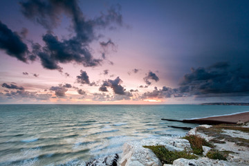 Sunset on the sea at Seaford Head, Sussex, England
